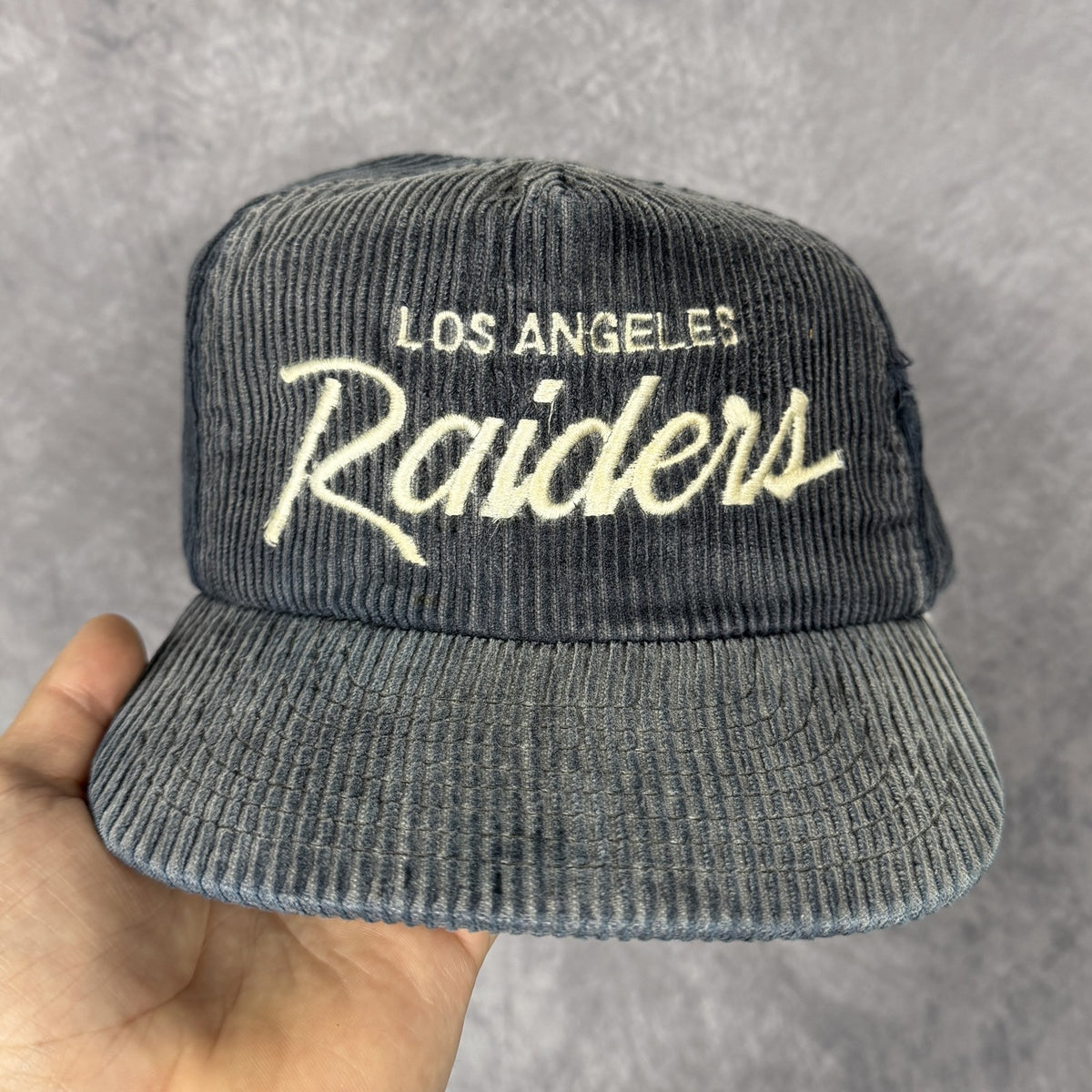 90s Faded Black Los Angeles Raiders Sports Specialties Corduroy Script Strap Hat 6797